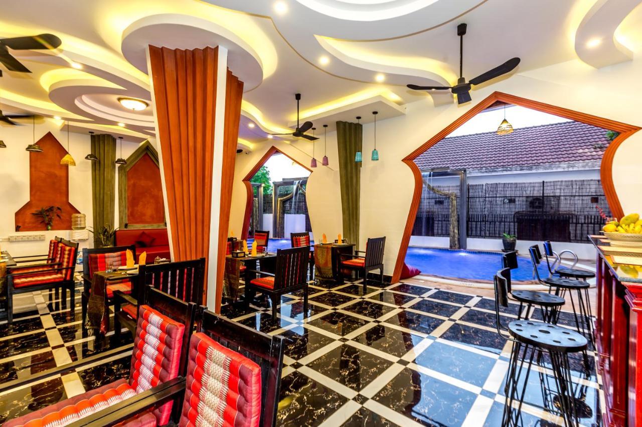 Готель Ambient Angkor Boutique Сіємреап Екстер'єр фото